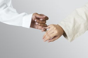 Hands of diversity coming together in unity