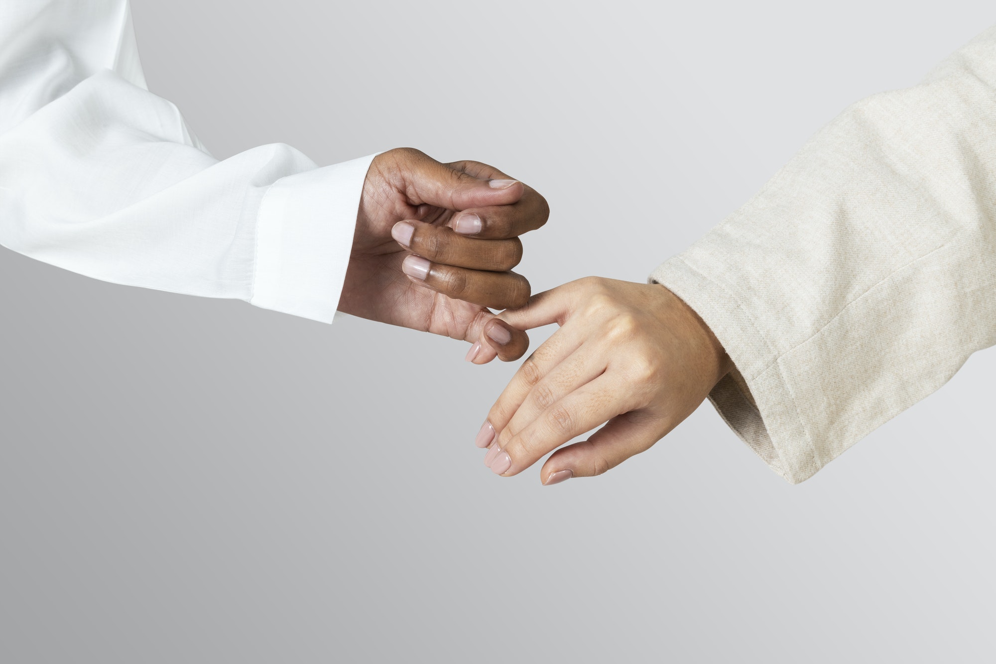 Hands of diversity coming together in unity